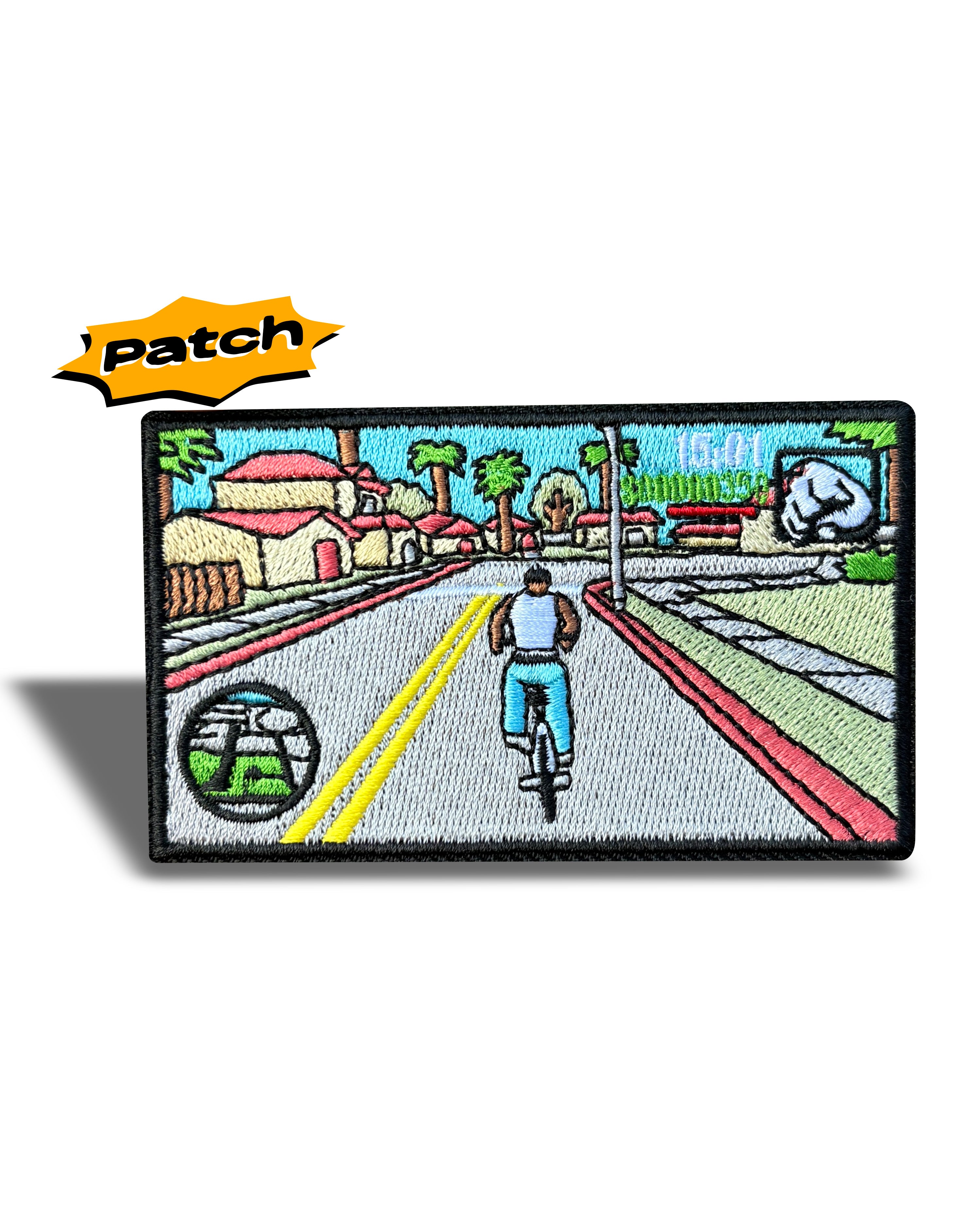 An embroidered rectangular patch featuring a retro video game street scene with a cyclist, shown on a white background with a yellow 'Patch' label in the top left.