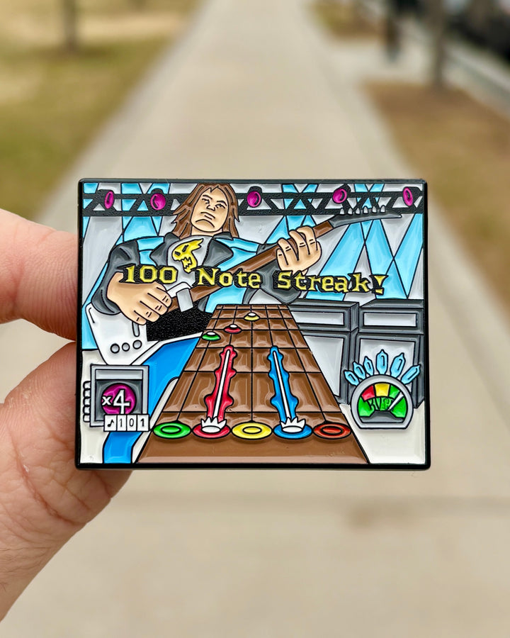 Guitar Hero Enamel Pin - Held in Hand