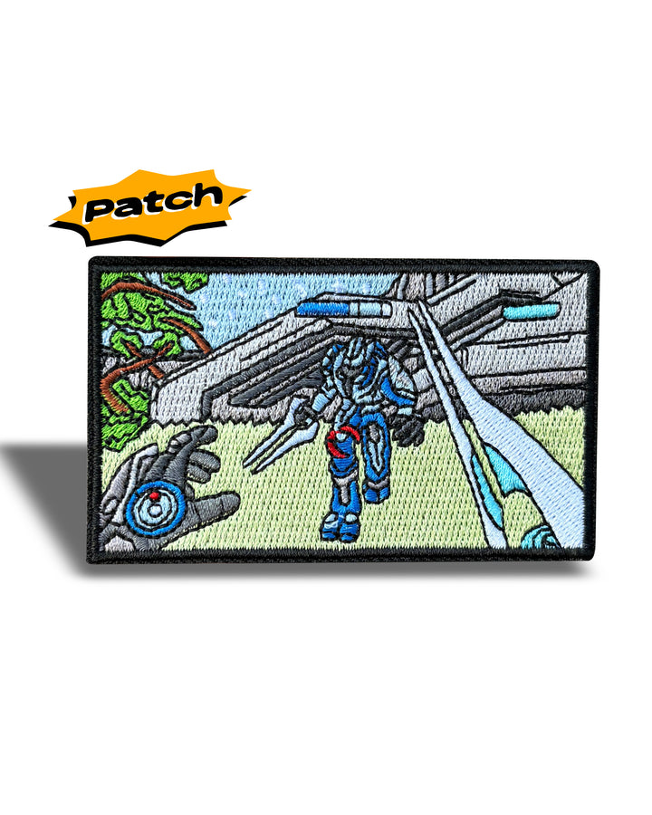 An embroidered rectangular patch featuring a sci-fi mecha robot in blue and red armor walking in front of a futuristic gray structure, with a yellow 'Patch' logo graphic above it on a white background.