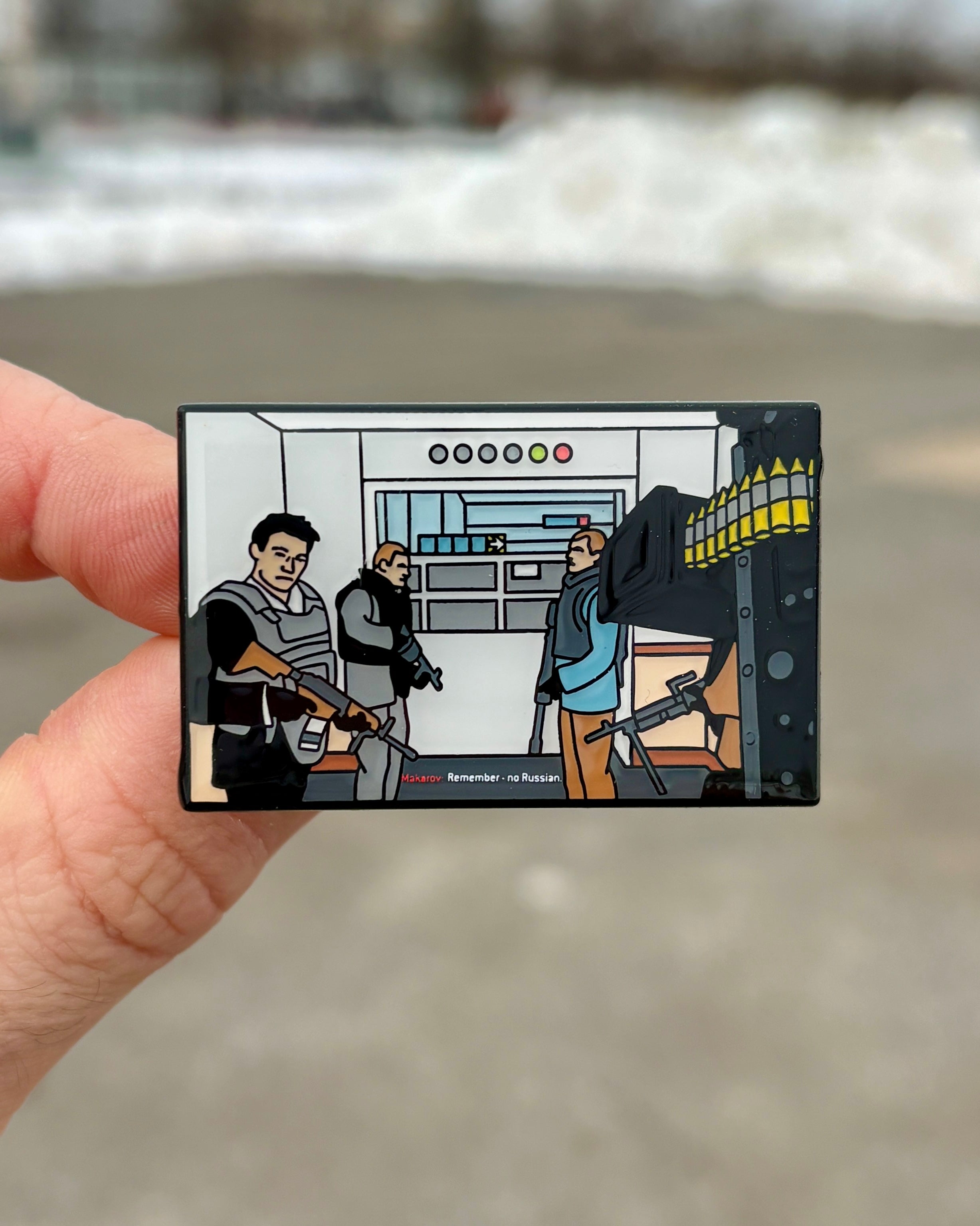 Modern Warfare 2 No Russian Enamel Pin - Held in Hand